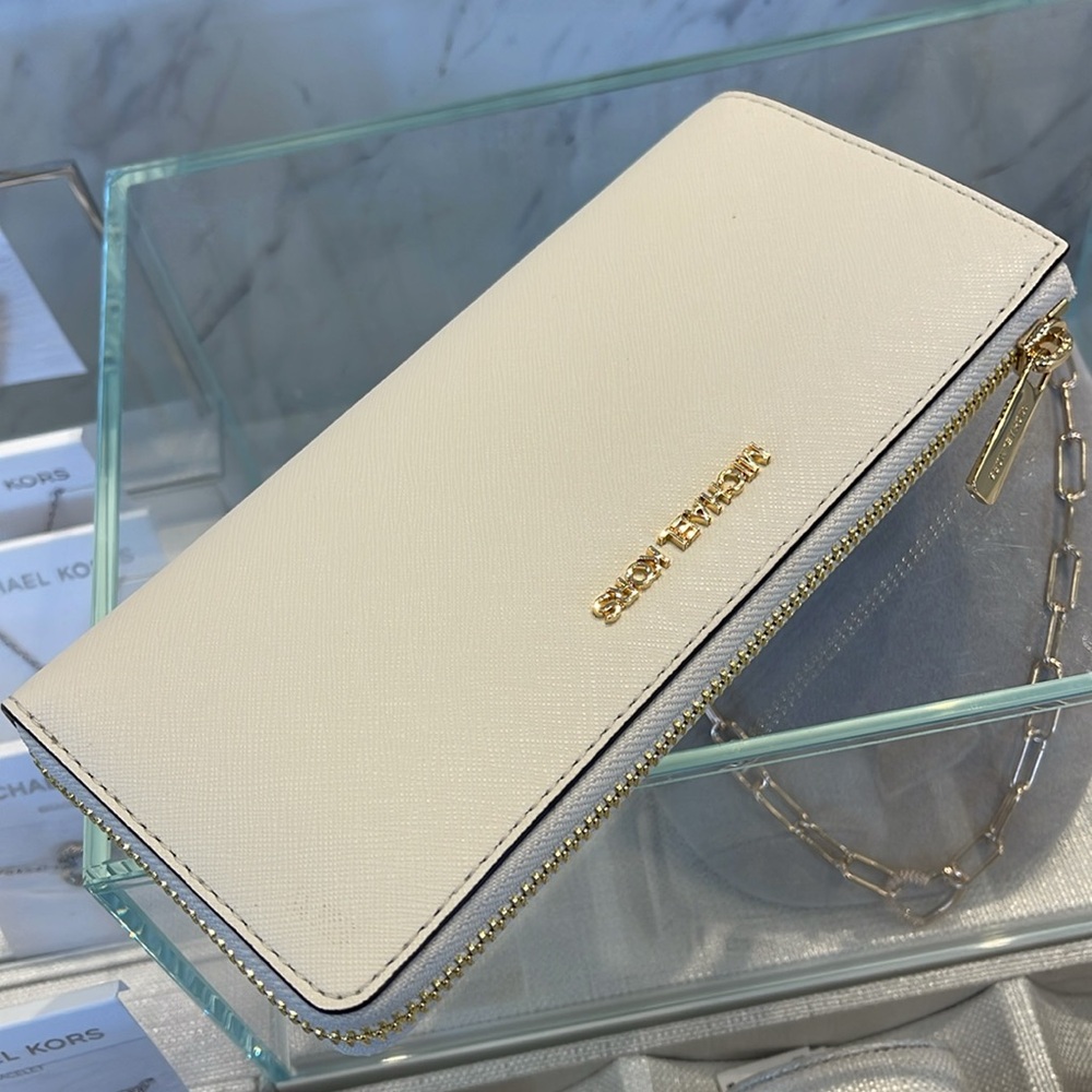 MICHAEL KORS Jet Set Travel Lg Saffiano Leather Quarter-Zip Wallet
Light Cream - Picture 8 of 16